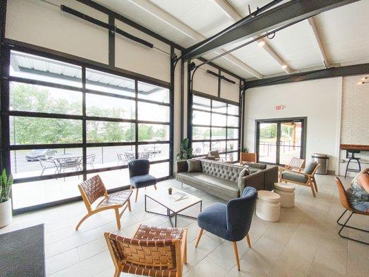 Enjoy the views from inside looking through the two large glass garage doors.