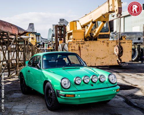 A safari themed vintage Porsche was in the boneyard for the day's show.