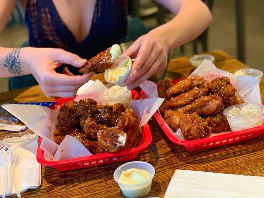 Extra large order of hot king wings with the aioli dipping sauce... pickled radish included...