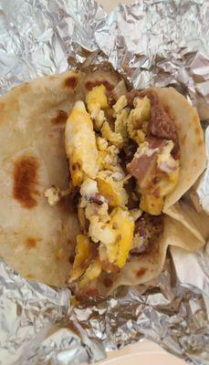 Bacon, egg, beans breakfast taco.