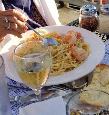 Shrimp scampi over pasta