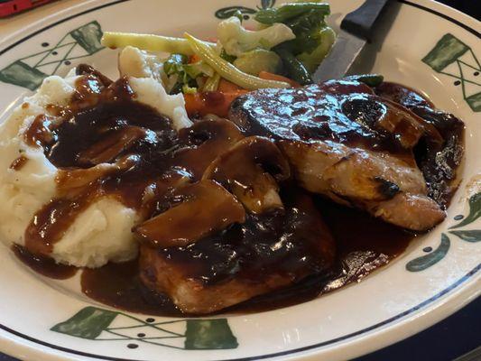 Double pork chops, mashed potatoes, fresh sautéed garden vegetables