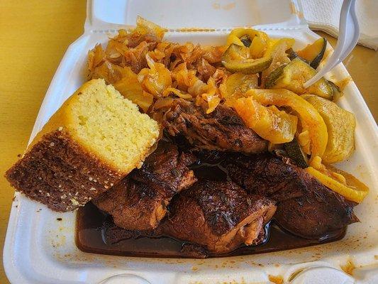 Large jerk chicken with spicy squash and spicy cabbage