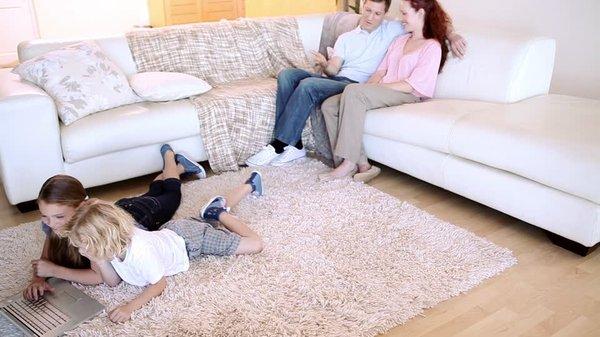 A deep cleaned carpet in a happy home.