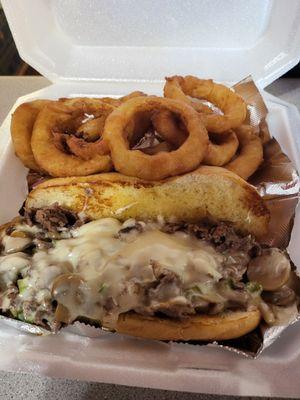 Philly cheese steak,  and onion rings