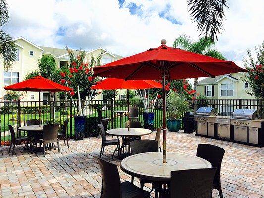 Plenty of poolside tables as well as a gas grill allows residents to have a cookout with friends and family.