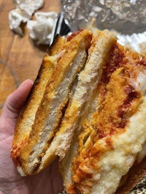 Pressed chicken cutlet parmigiana hero