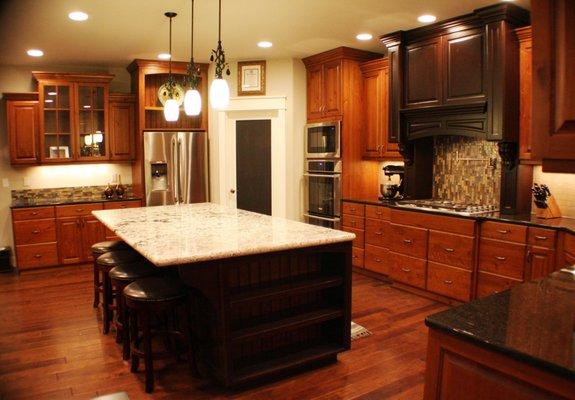 Kitchen with mosaic backsplash tile and hardwood floor