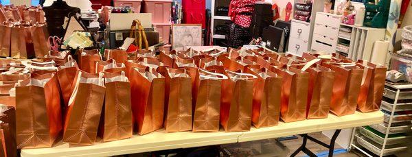 Rose Gold Gift Bags created by TriState Events for the first 100 attendees of the International Women's Day 2022 hosted in Frederick, MD.