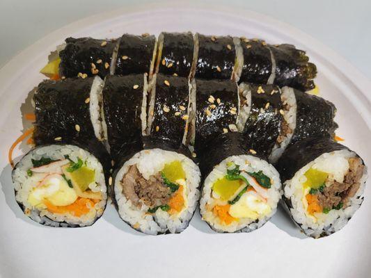 Gimbap
(Gimbap is a Korean dish made from cooked rice, vegetables, fish, and meat rolled in gim dried sheets of seaweed)