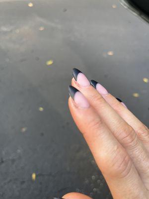 Black on nail bed and in cuticle