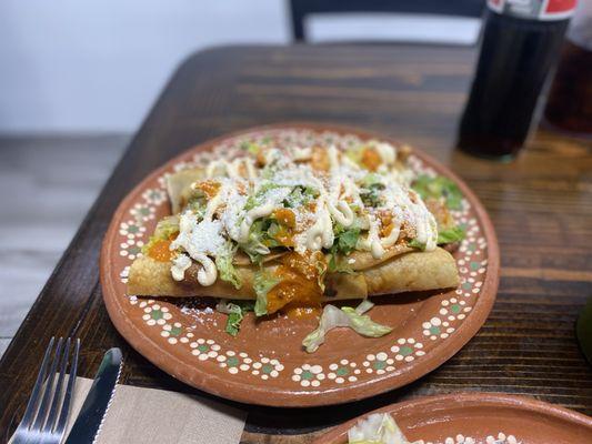 The taquitos plate Guatemalan style