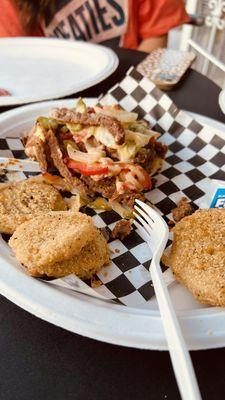 Philly cheesesteak with fried green tomatoes