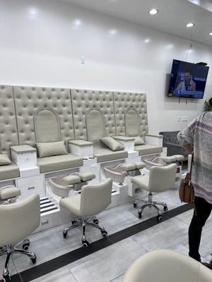 Inside nail salon, pedicure stations