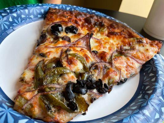 Veggie pizza slice, amazing flavor and char