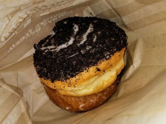 Oreo Creme donut, pumpkin spice donut underneath. Both are meh at best.