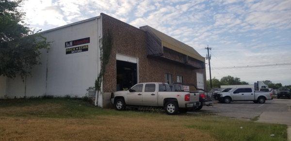 Drive up view of shop as you turn onto Promeneade St.