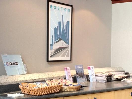 Snacks in the Club Acela Lounge along with newspapers on the far right