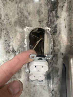 Can't get electrical outlet back in