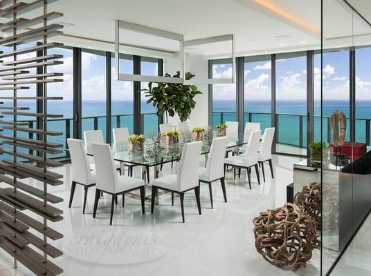 Interior design photography using strobe lighting to balance the interior with the ocean view.