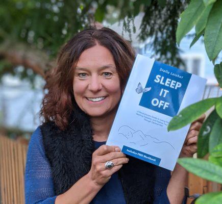 Stella Loichot with her #1 best-seller book on how to beat insomnia and improve sleep for better health