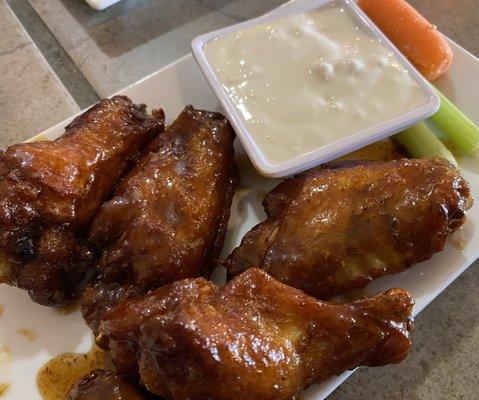 Honey garlic bone-in wings with blue cheese dipping sauce