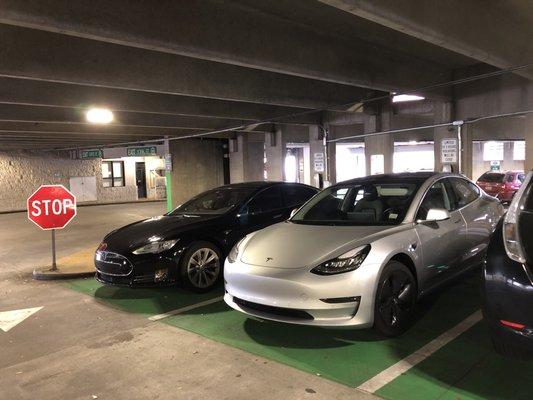 Two Tesla charging spots.