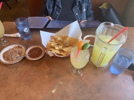 Chips, salsa, beans and Margaritas