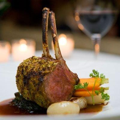 Roast Rack of Lamb coated with Rosemary Crumbs, Ciopplini Onion, Baby Carrots, Lamb Jus