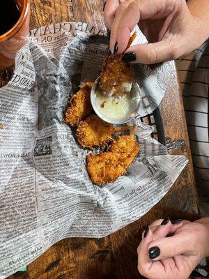 Coconut shrimp appetizer ordered as her meal.