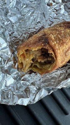 Philly steak egg roll. JUST GET IT!  Amazing.