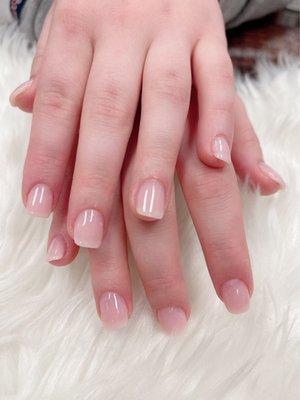 Natural short nail with light shaping.