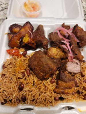 Grio, sweet plantain, rice and beans with piklis