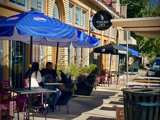 The outside sidewalk seating and entrance to Veracruz