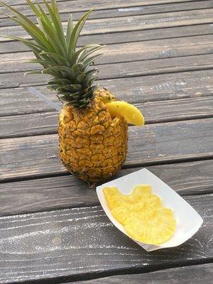 Pineapple with Coconut, Strawberry, and Pineapple Smoothie inside plus Pineapple Slices