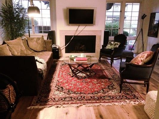 Photo taken at night so you cannot see the amazing-ness of our vibrant, stunning new rug!! So grateful for Tousi!!