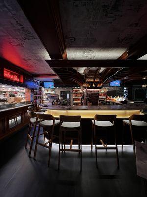 Bar view from the other side and view of the open kitchen