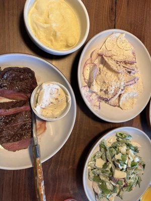 Steak, winter slaw, pea salad, n creamy mashed potatoes. Oh yeah, that's bone marrow butter right there. It's incredible.