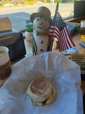 Bacon and egg and cheese on an English muffin