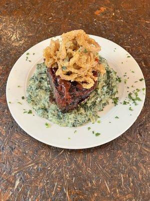 Smoked Meatloaf on a bed of Creamed Spinach