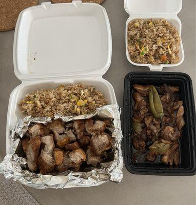 Lechon Kawali, chicken adobo and sides of fried rice