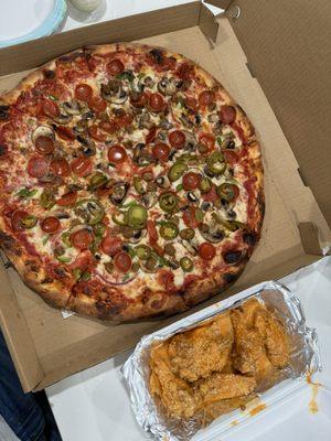 Combination pizza (+jalapeños), buffalo-garlic parm wings.