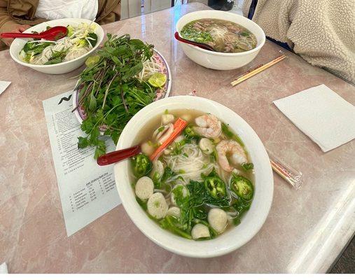 Seafood pho(F), veggie pho(L), combination pho(R)