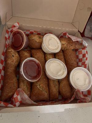 Breadsticks with extra ranch and marinara sauce.