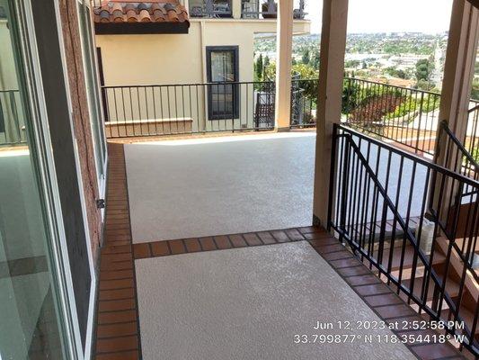 Deck waterproofing with border brick pattern