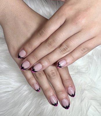 Gel manicure with bat french tips.