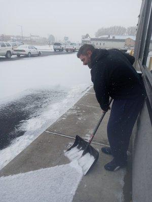 Our Service Director making sure the sidewalks are clear for customers!