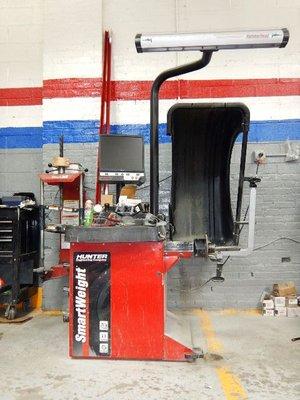 Hunter's SmartWeight Touch Wheel balancer is the fastest floor-to-floor wheel balancer of it's kind.