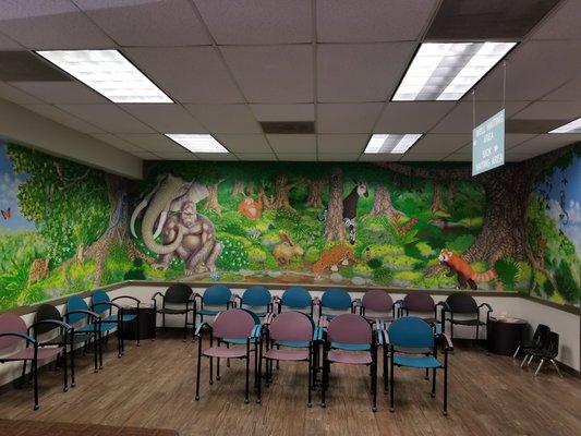 Our Well Visit waiting room mural is on 3 walls, but looks like 1 large wall.  :-)  It is still in progress though.