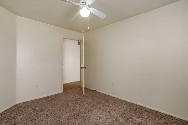 Bedroom with carpet flooring and multi speed ceiling fan